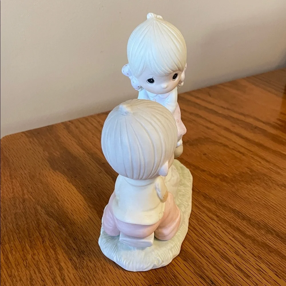 Precious Moments Figurine “Love Lifted Me”